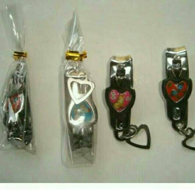 

Souvenir gunting kuku love