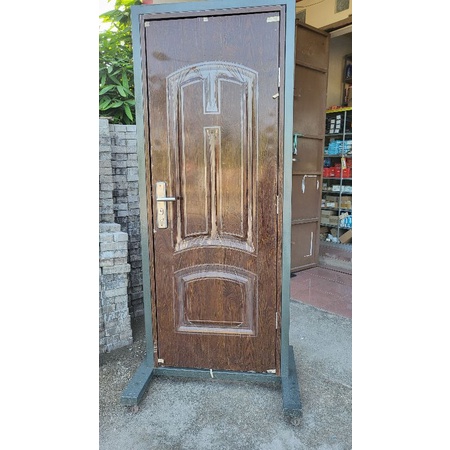 PINTU BAJA MOTIF KAYU URBAN FORTRESS