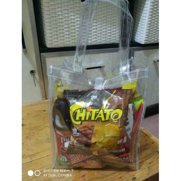 

TAS IDUL FITRI FULL TRANSPARAN P.20 X L.10 X T.25 potret