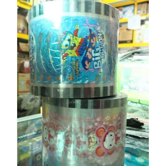 `````````] tutup plastik gelas minuman di mesin sealing/  cup sealer