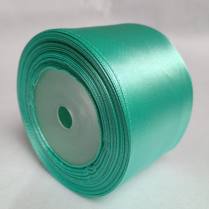 

Pita satin hijau tosca 1,5 inch 3.81 cm Per roll