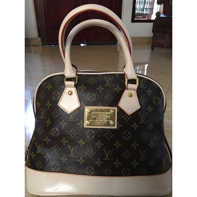 TAS LV NOT AUTHENTIC (PRELOVED)