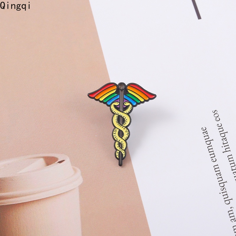 Bros Pin Enamel Bentuk Kartun Ular Dengan Sayap Warna Pelangi Bahan Alloy Untuk Hadiah