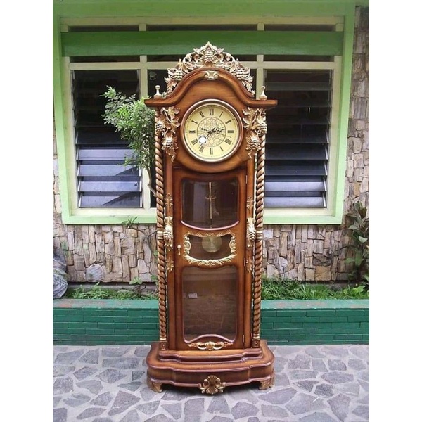 almari jam jati ukir mawar kayu jati klasik modern mewah furniture murah mebel jepara