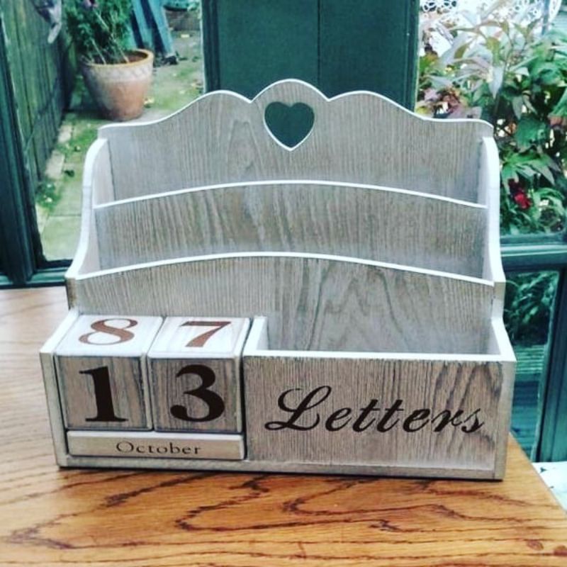 

tempat stationery plus kalender bahan jati
