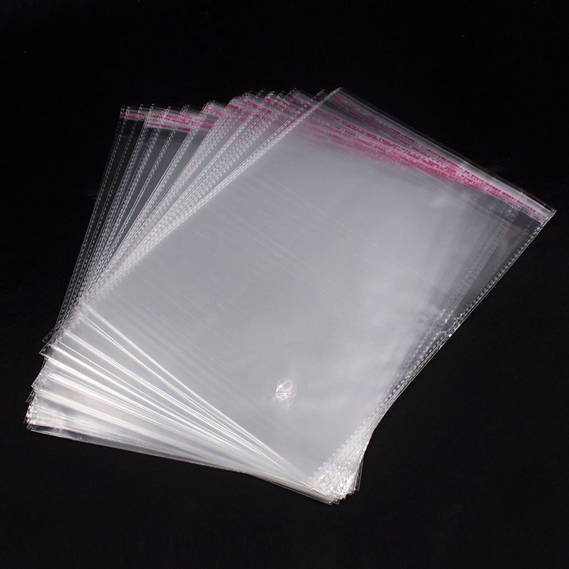 

20X30 CM PLASTIK OPP (SEAL/LEM) TEBAL 0,4 ASLI / PLASTIK KEMASAN JILBAB / BUKU