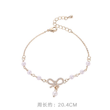 HBS 041 Gelang Mutiara Cinta Berbentuk Pita Gelang Wanita Keren  041 - GL