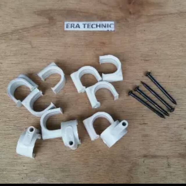 Klem pipa 5/8" / klem pipa listrik 5/8". Komplit dengan paku beton