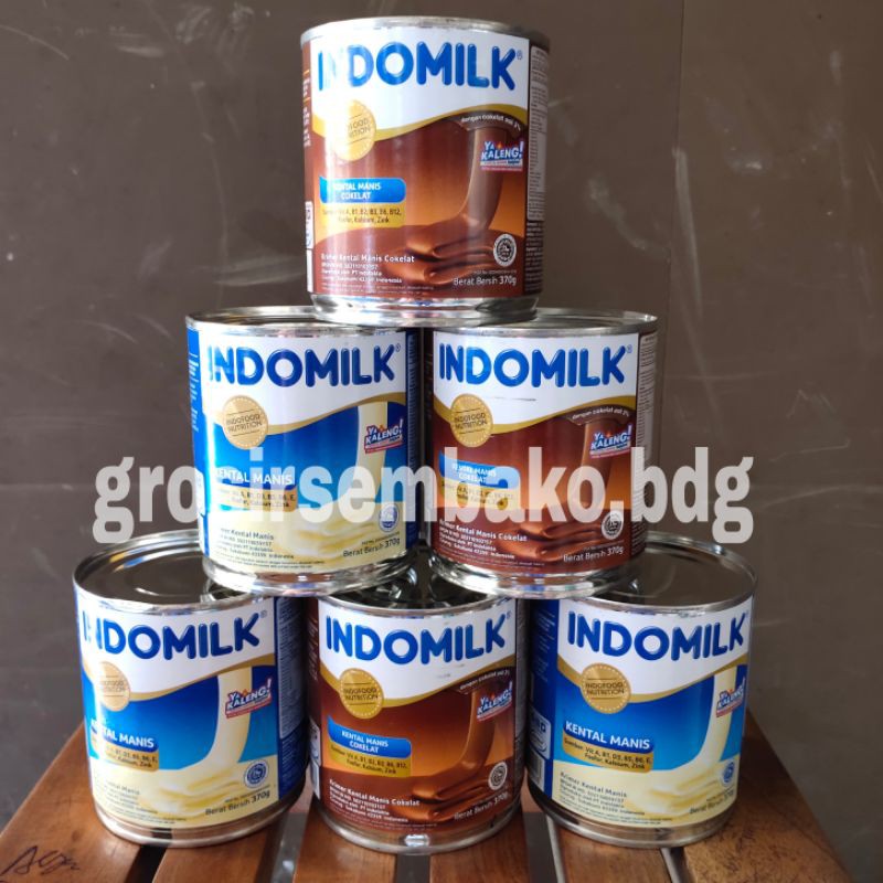 

INDOMILK Kaleng Putih/Cokelat
