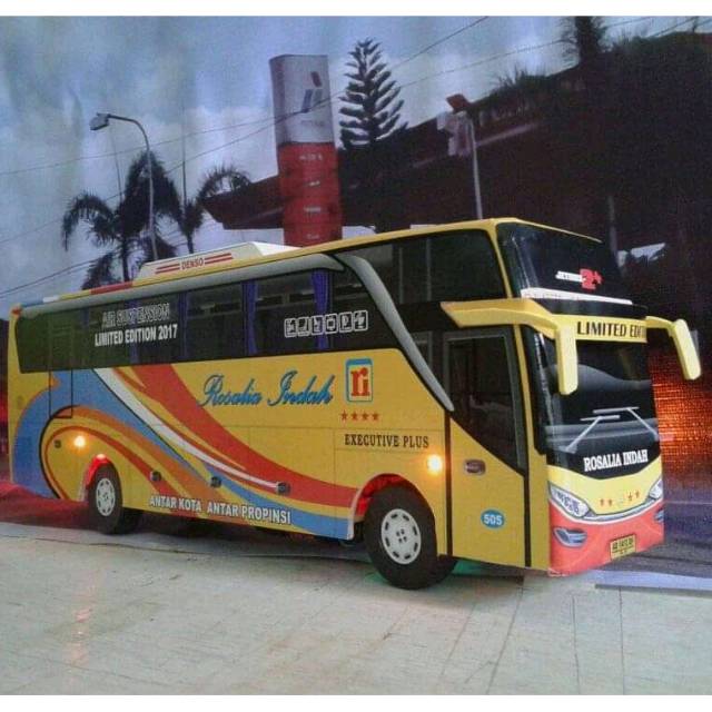 Miniatur bus besar rosalia indah kuning