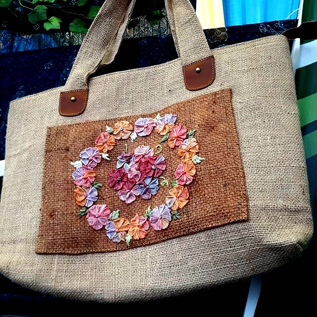 

tas goni bunga rafia