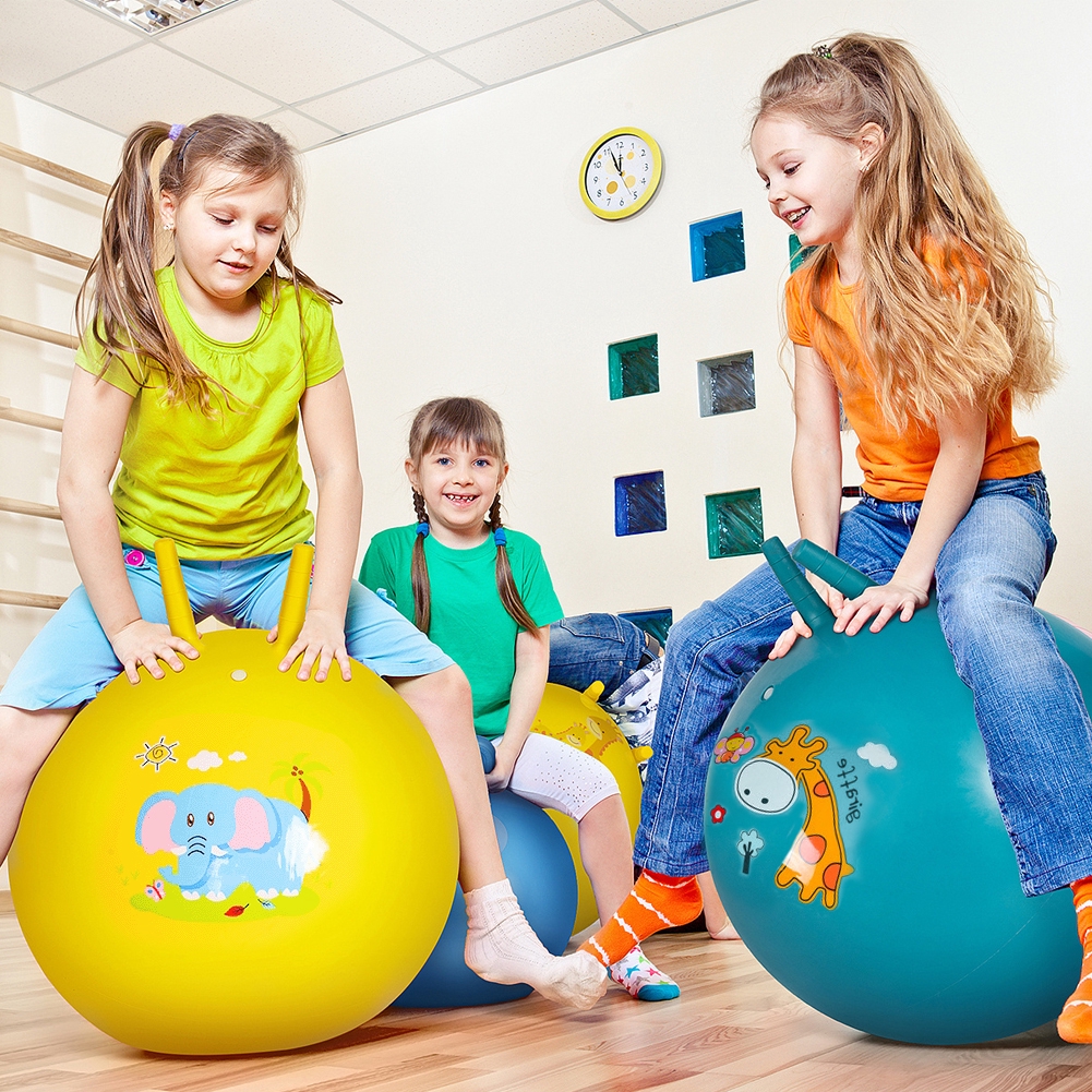 kids bounce on ball