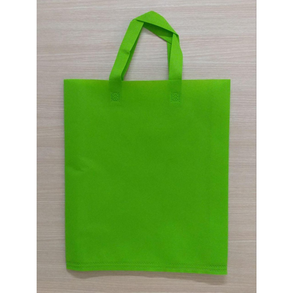 

GOODIE BAG SPUNBOND HANDLE 38x45 (Per Lusin) / Tas Belanja Murah / Kantong Belanja / Souvenir