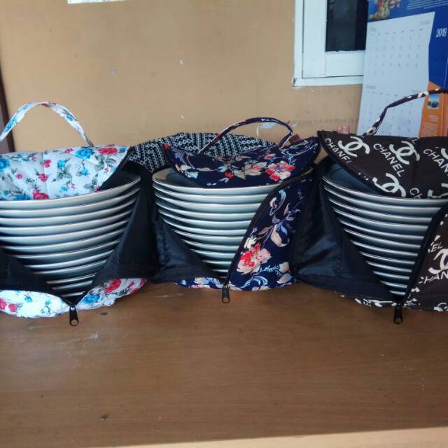 sale  jadi 55 ribu Sarung atau tas piring sango 1 lusin