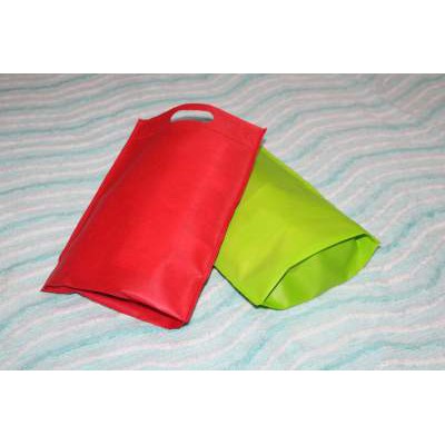 

Tas Goodiebag Spunbond Model D-Cut Lipat Bawah 25x35 cm