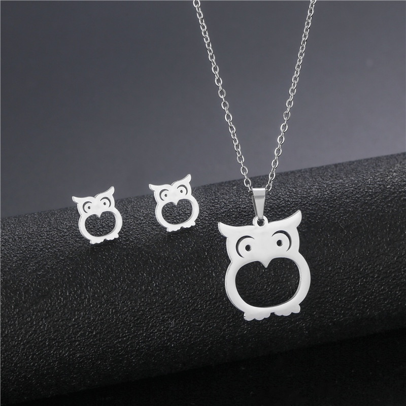 Eropa dan Amerika fashion kalung liontin set kepribadian burung hantu glossy stainless steel sweter