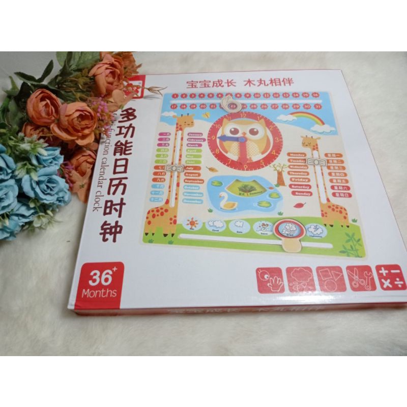 

montessori kalender jam. multifunction calender clock. peraga kalender. peraga jam. wooden clock. wooden calender
