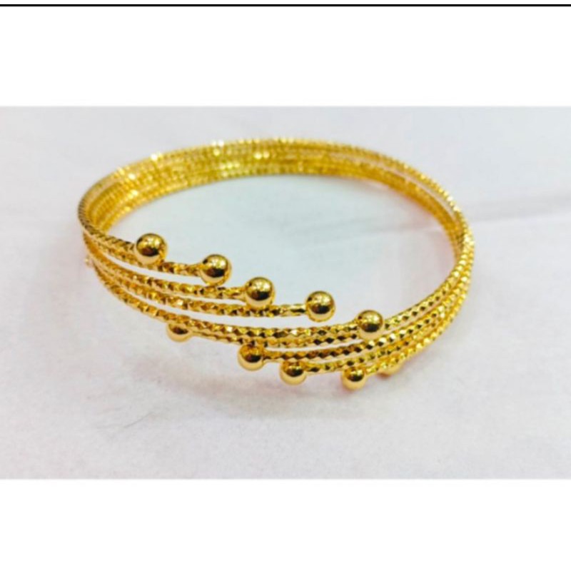 gelang tangan motif keroncong lilit perhiasan wanita titanium gold