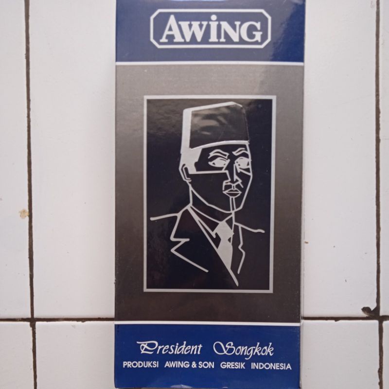 songkok awing AC, peci awing