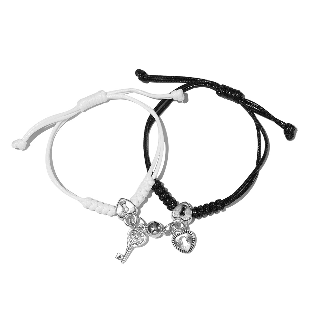 2pcs Gelang Tangan Magnetik Gaya Korea Warna Hitam / Putih Untuk Pasangan / Pria / Wanita