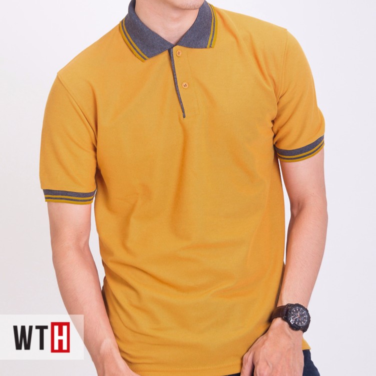  KAOS  KERAH  POLO SHIRT KUNING  TUA KUSAM WHAT THE HEAVEN 