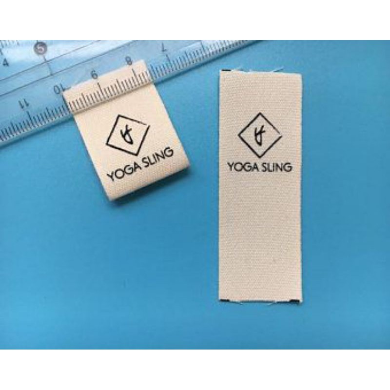 

Label baju / Pakaian / Konveksi Sablon Custom KREM 2,5 CM