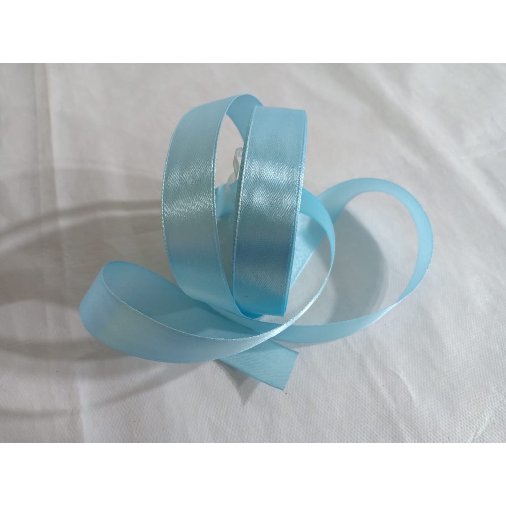 

Pita satin Biru muda 1/2 inch / 1.27cm Per roll