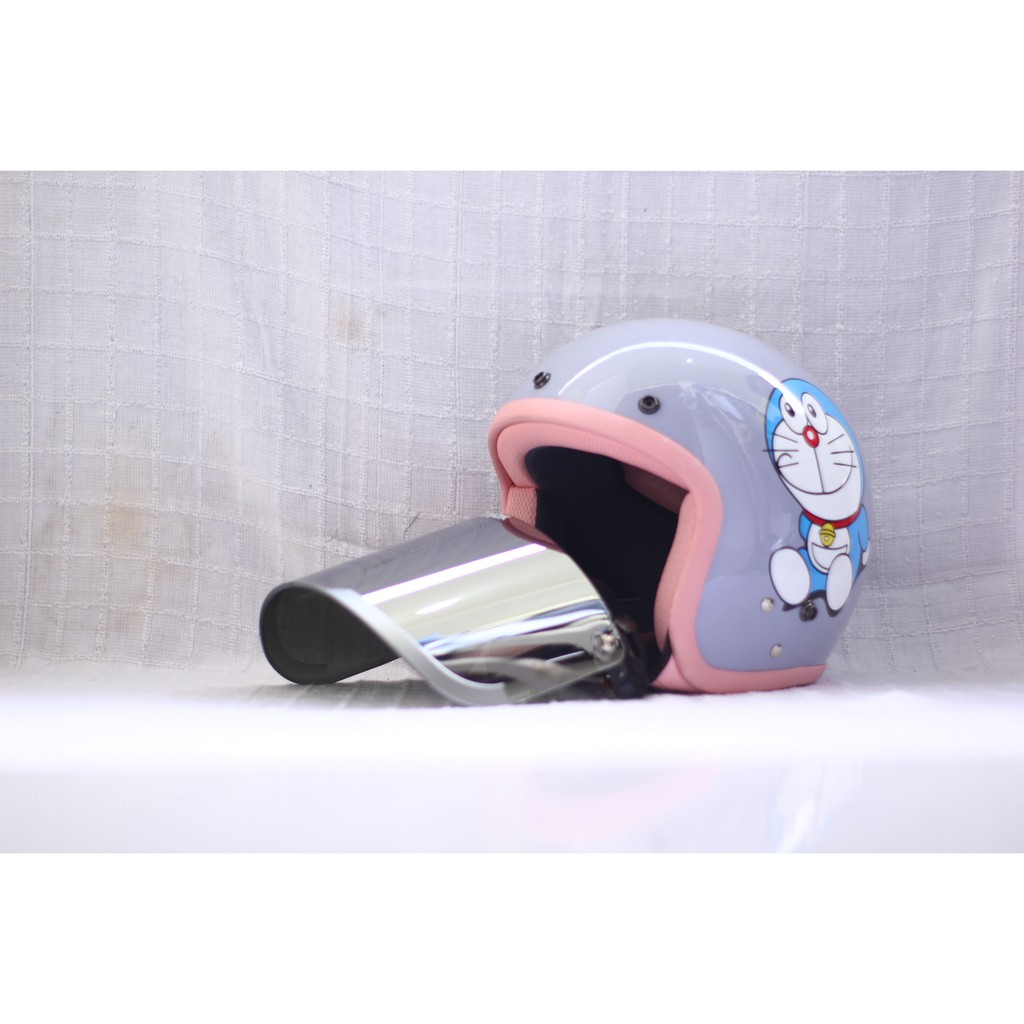 HELM BOGO CAMELIA PASTEL DORAEMON DEWASA KACA DATAR SILVER-1