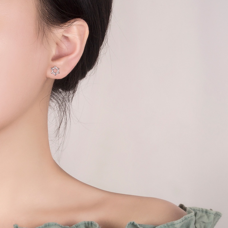 Anting Bentuk Bintang Model hollow Warna silver Untuk Hadiah