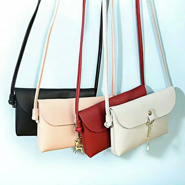 Tas slempang motif rusa