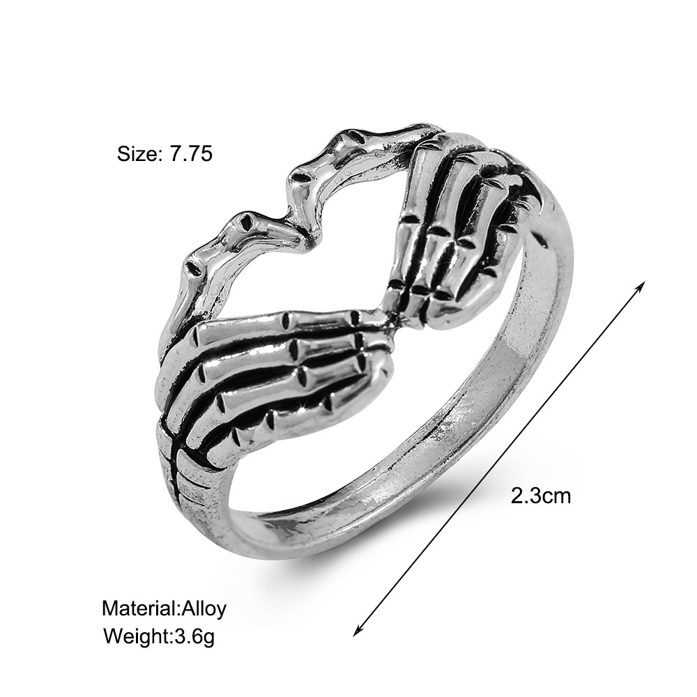 Cincin Desain Kerangka Tangan Warna Silver Gaya Punk Rock Vintage Untuk Wanita