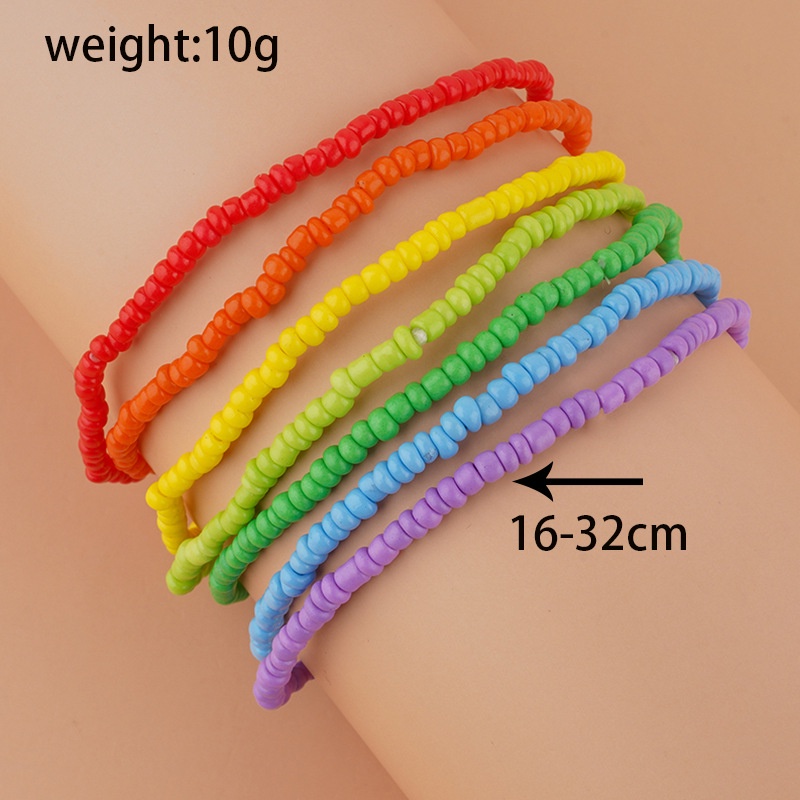 7pcs / Set Gelang Keberuntungan Manik-Manik Nasi Warna Pelangi Elastis Dapat Disesuaikan Untuk Wanita