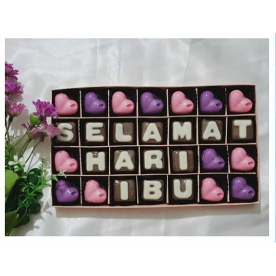 

cokelat praline huruf sekat 4x7 ( say with chocolate) 28 pcs