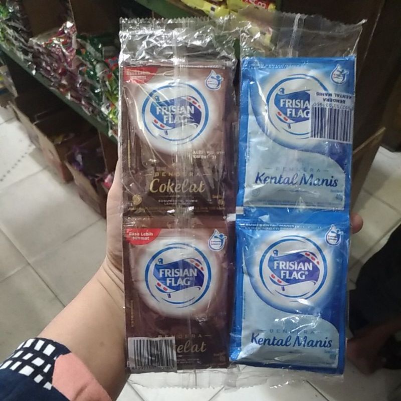 

SUSU BENDERA FRISIAN FLAG Kental Manis Sachet isi 6