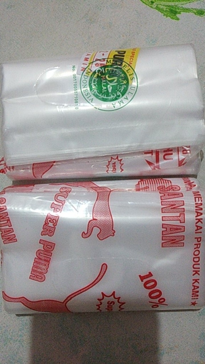 Plastik Pe Cap Puma Ukuran 1/2 Kg (12x25cm)