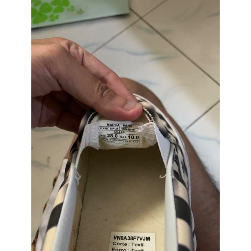 Vans slip on checkerboard blur