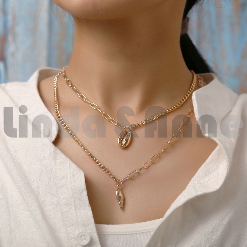 Kalung Rantai Multi Layer Liontin Kerang / Tanduk Kerang Bahan Alloy untuk Wanita