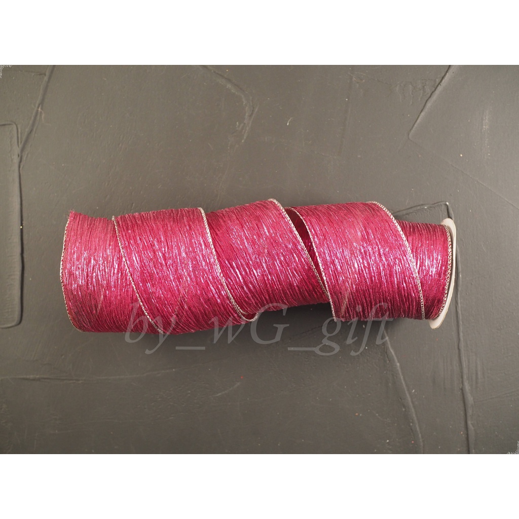 

Pita Kain Natal Corak ; Lebar 6,3 cm; Panjang 3 yard - Warna Ungu