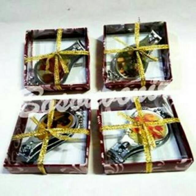 

Souvenir gunting kuku oval kemasan box mika