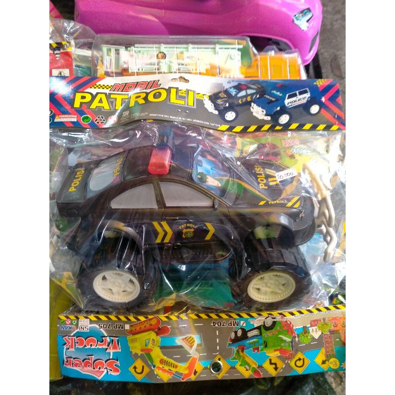 mobil polisi dorong