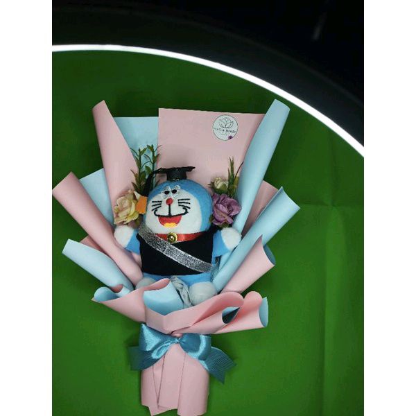 

buket doraemon dan bunga