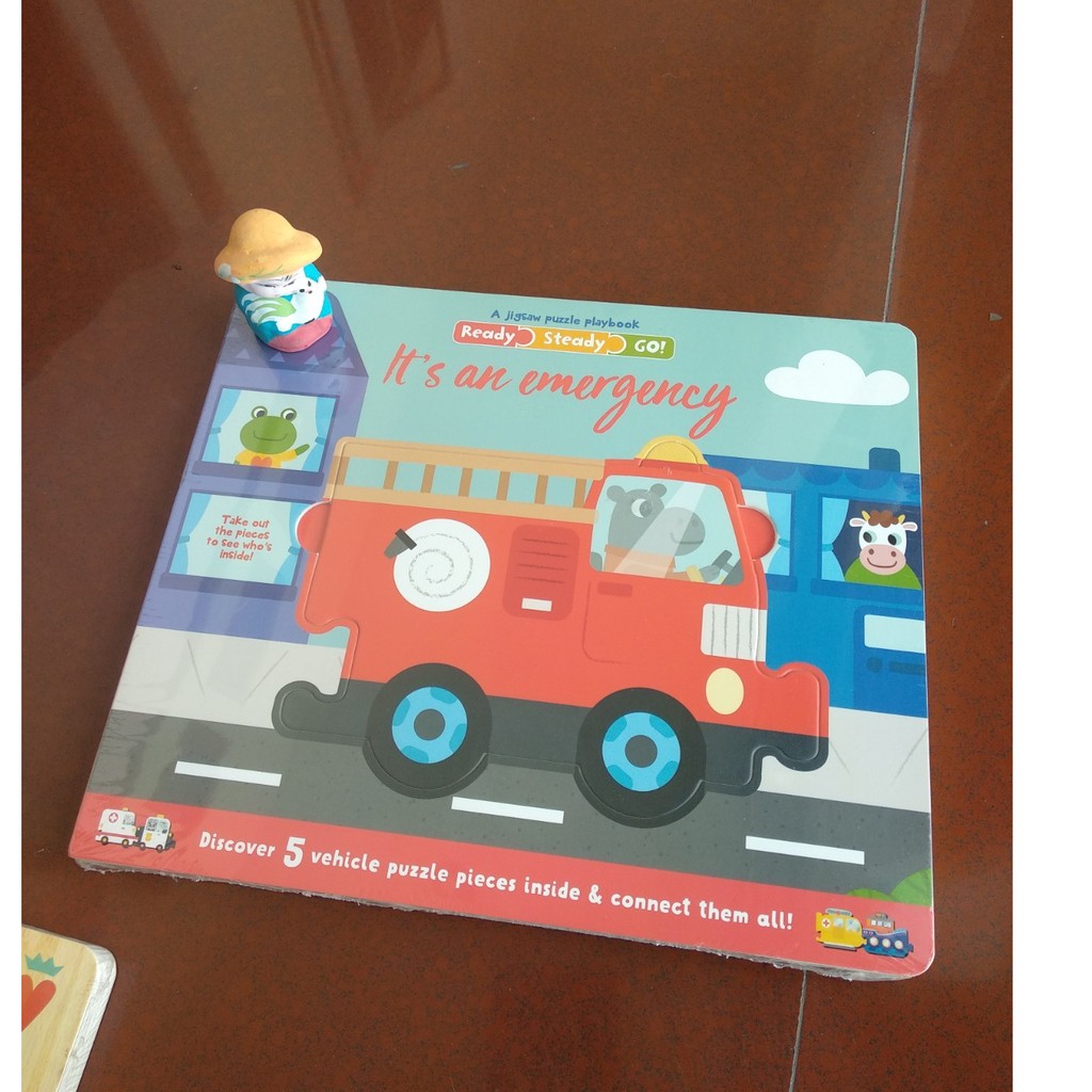 A jigsaw puzzle playbook Emergency Board book