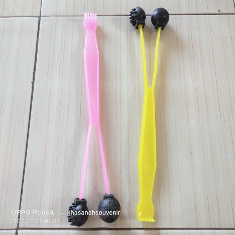 Alat pijat garukan punggung plastik