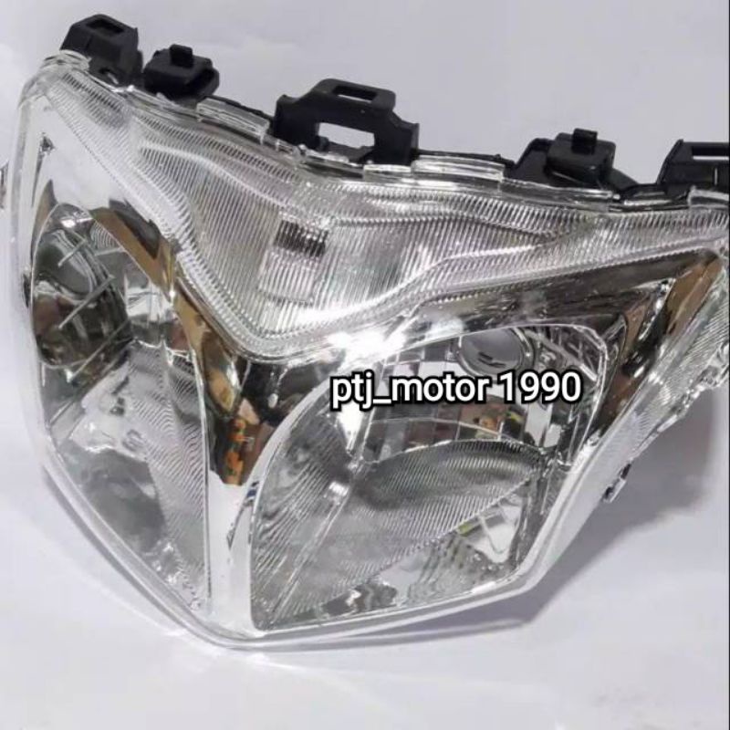 MIKA LAMPU/REFLEKTOR HONDA SUPRA X125 HELM/WIN PRODAK