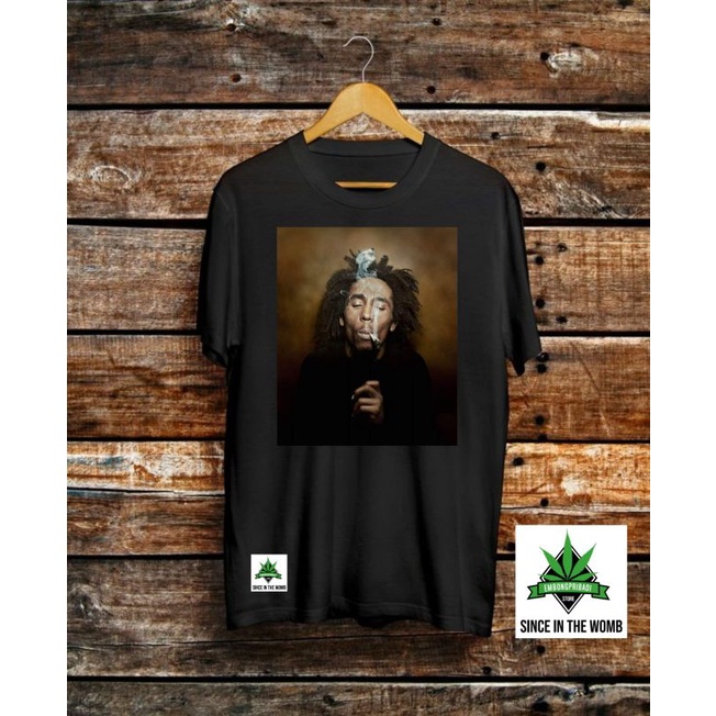 KAOS DISTRO ORIGINAL. KAOS MOTIF BOB MARLEY. KAOS MOTIF DAUN GANJA.
