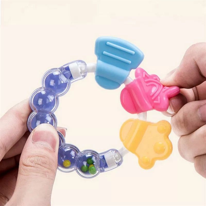 2in1 Mainan gigitan bayi teether dan Rattle genggam Model Bulat