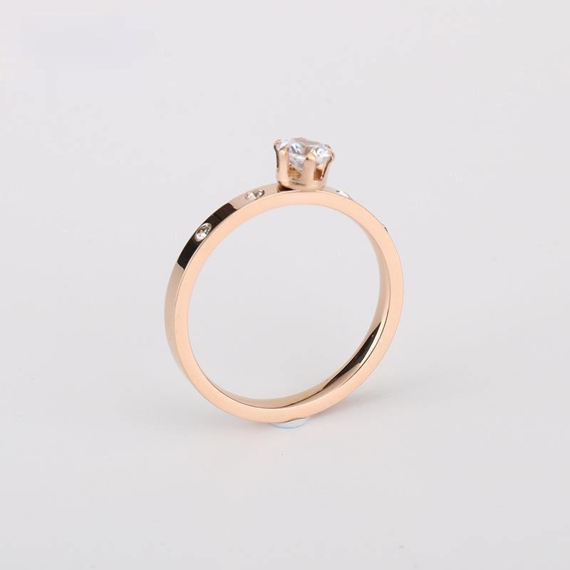 Cincin titanium mata satu dengan mata tambahan di samping