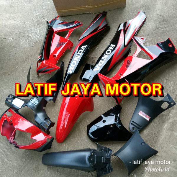 paketan full Body supra X 125 2006 merah ferarry .