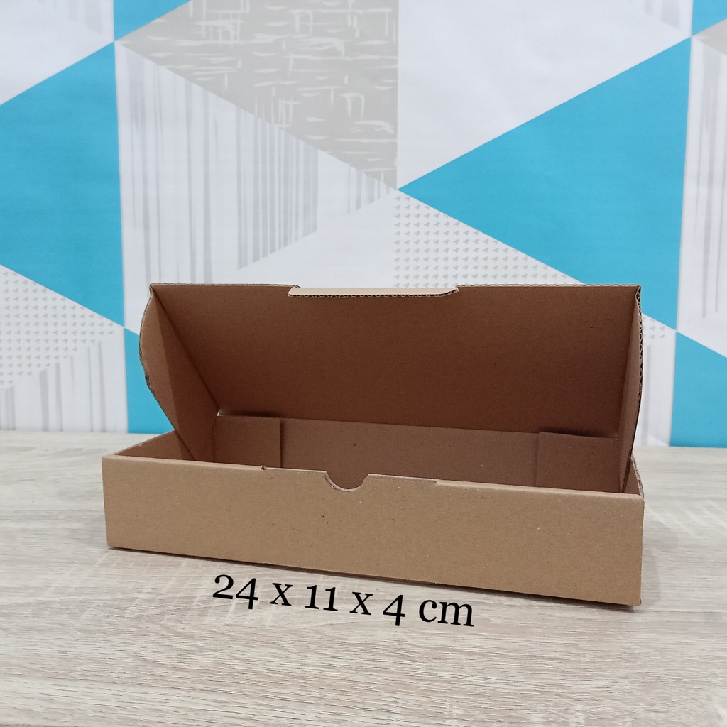 

Kardus 24 x 11 x 4 cm....Die Cut kotak aksesoris dll