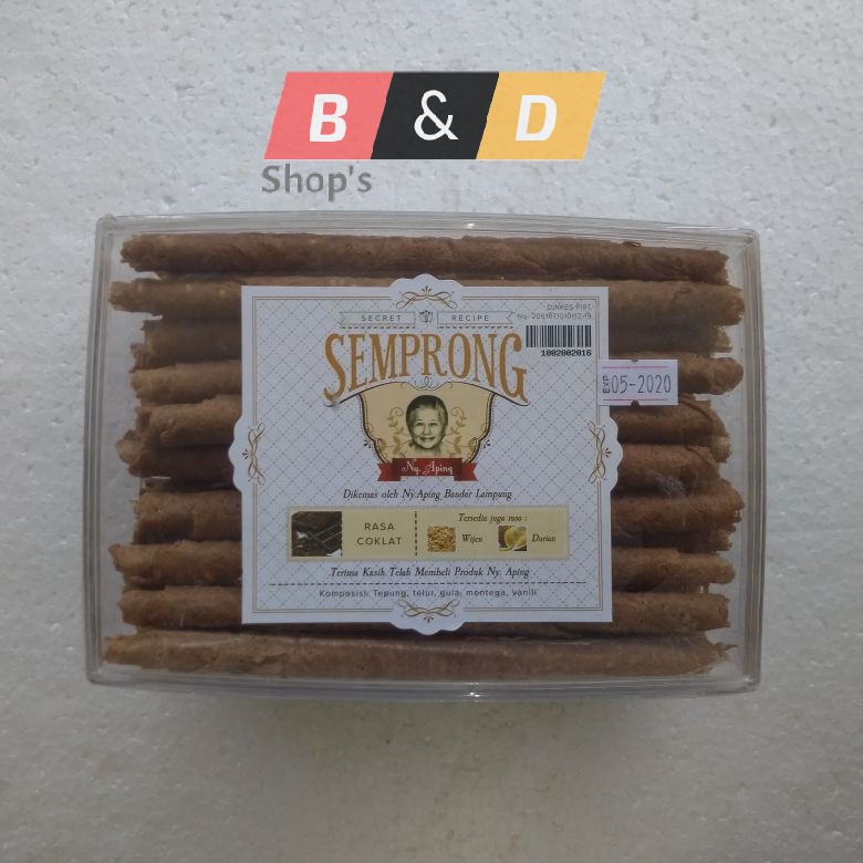 

NY. APING. Kue Semprong Khas Lampung Kemasan Toples Persegi Netto 500 Gram.